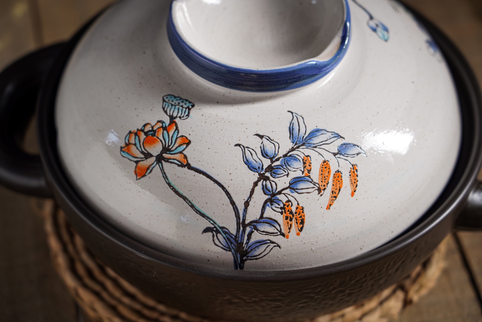 Detail of the hand-painted lotus lid